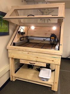 a wooden bed frame sitting in the corner of a room