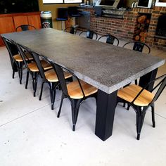 a long table with six chairs around it