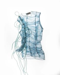 a piece of clothing that is made out of plastic and has wires attached to it