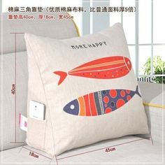 a pillow that has some fish on it