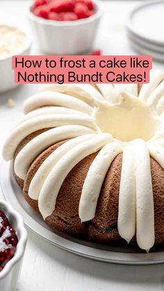 a bundt cake with white icing on a plate