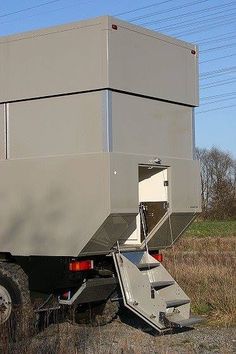 the back end of a truck with a trailer attached to it