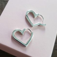 sterling silver heart huggie hoop earrings 17x19mm Endless possibilies with these cute heart huggies perfect craft supply for Valentine's Day, Mother's Day, weddings and anniversaries. Heart Huggies, Day Weddings, Earrings Heart, Cute Heart, Craft Supply, Huggie Hoop Earrings, Sterling Silver Heart, Silver Heart, Sterling Silber