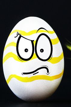 an egg with a face drawn on it