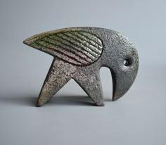 a metal object that looks like a bird