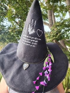 This beautiful hat is made with the everyday witch in mind!  It is fully reversible and includes a gorgeous accessory that can be used with either side or as a necklace to compliment the hat! The charm is handmade from resin, real lavender, rosemary and sea salt in resin. The lavender around the hat is handmade from tiny cut pieces of felt and wire. Created from soft fleece with 2 layers of a medium weight stabilizer to give it shape but not too stiff.  If you like this idea but want a different fabric, color scheme, embroidery etc please send me a message! Lavender Rosemary, Practical Magic, Costume Hats, Beautiful Hats, Witch Hat, Different Fabrics, Sea Salt, Costume Accessories, Medium Weight