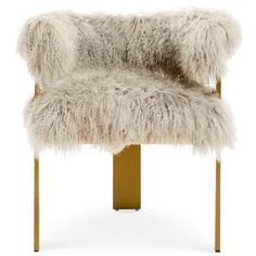 a white chair with furry fur on it's back and gold metal legs, against a white background