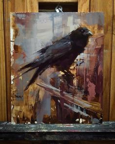 a painting of a black bird sitting on top of a wooden frame