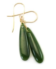 Green Nephrite Jade Earrings Natural deep rich green nephrite jade Smooth cut long teardrops Over 20 carats, nice medium large drops Earwires available in 14k solid gold, 14k gold filled or sterling silver Gem size is 10x30mm, earrings hang 1.7 inches Versatile - casual or dressy and great everyday earrings Mannequin shows relative size Visit My eBay Store!: Spyglass Designs Please note photos show camera lighting, shadows and reflections. Jewelry comes packaged in a small colorful tie pouch. Ge Forest Green Jewelry, Unique Dangle Earrings, Small Drop Earrings, Small Dangle Earrings, Earthy Jewelry, Jade Earrings, Glasses Chain, Bling Rings, Green Earrings