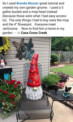 a garden gnome sitting on top of a metal chair