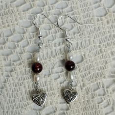 Genuine Garnet And Freshwater Pearl Earrings. Marked S925 Sterling Silver Hooks. Tibetan Silver Heart Dangles. Handmade One Of A Kind. Measures 2" Including The Hook. Bundle With Other Items From My Closet For Discounts And Combined Shipping. Questions And Offers Are Welcomed:) Cute Handmade Dangle Heart Earrings, Downtown Girl Earrings, Metal Heart Beads Drop Earrings, Metal Heart Dangle Earrings With Heart Beads, Vintage Handmade Dangle Heart Earrings, Red Dangle Earrings With Heart Beads, Pink Tassel Earrings, Beaded Jewelry Necklaces, Black Earrings Dangle