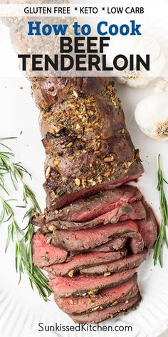 how to cook beef tenderloin on a white plate with rosemary sprigs