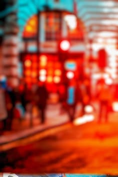 blurry photograph of people walking on the street