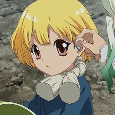 an anime character with blonde hair and blue eyes is holding something up to her ear