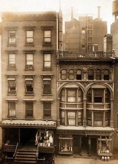 an old building with many windows and balconies