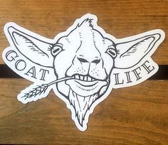 an image of a goat sticker on the side of a wooden box that says goat life