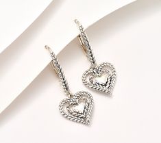 Shower your favorite jewelry fan in love -- and acknowledge what's meaningful to them -- with a gift of these double-heart Symbols of Love earrings. From JAI. Valentine's Day Double Heart Fine Earrings, Fine Jewelry Double Heart Earrings For Valentine's Day, Valentine's Day Fine Jewelry Double Heart Earrings, Elegant Double Heart Earrings For Valentine's Day, Sterling Silver Double Heart Earrings, Elegant Double Heart Earrings As Gift, Double Heart Charm Earrings For Anniversary, Sterling Silver Earrings For Mother's Day Anniversary, Sterling Silver Earrings For Anniversary