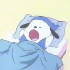 a cartoon character laying in bed with his mouth open