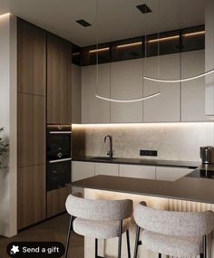 a modern kitchen with bar stools next to the counter