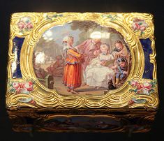 an ornately decorated box with paintings on it