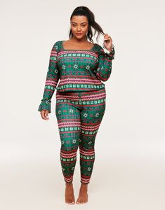 Stay warm this winter with this cozy, Fair Isle print pointelle knit PJ set. The set includes a long sleeve top with lettuce edge hems and leggings with an elastic waistband, faux placket, and snaps. (Available in plus-sizes 1X-4X.) Holiday Long Sleeve Sets For Fall, Holiday Fall Sets With Long Sleeves, Cozy Long Sleeve Sets For Fall, Stretchy Green Winter Sets, Winter Fitted Long Sleeve Sets, Stretch Long Sleeve Winter Set, Fitted Long Sleeve Sets For Winter, Fitted Long Sleeve Winter Sets, Fitted Casual Holiday Sets