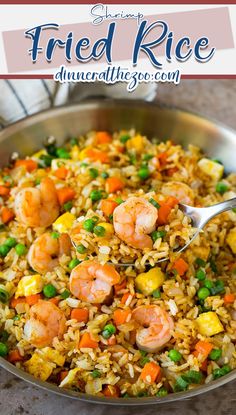 shrimp fried rice with peas and carrots in a pan