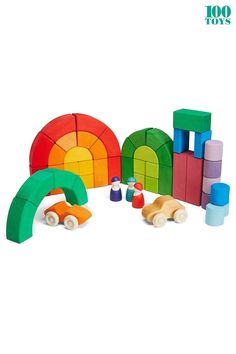 an assortment of colorful wooden toys on a white background