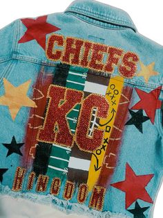 a jean jacket with the words chiefs kcc in red, white and blue stars on it