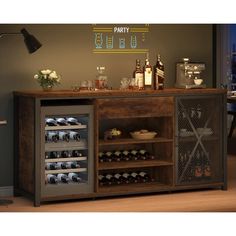 an image of a bar with bottles and glasses on the top shelf that is open