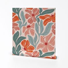 an orange and green flowered card on a white background