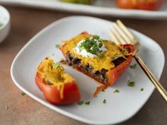 a plate with some stuffed peppers on it