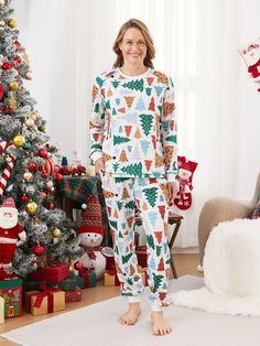 Perfect for family matching outfits, our Christmas tree patterned pajamas with a matching dog bandana are ideal for cozy nights and holiday parties.
* Please add each size separately to your shopping cart.
* Each size includes 1 set of pajamas (1 top+1 bottom), or 1 romper, or 1 pet bandana.
* * For children's safety, pajamas should be snug-fitting or flame-resistant. These kids' and babies' pajamas are flame-resistant.
* Adjustable drawstring and pocket in pants.
* Round neckline 
* Long sleeves.
* Casual, homey and festival.
* Comfortable fit 
* Moderate length.
* Imported, suitable for home and leisurewear. Patterned Pajamas, Pattern Pajamas, Christmas Pajamas Family, Pajamas Sets, Family Matching Outfits, Family Christmas Pajamas, Christmas Tree Pattern, Tree Pattern, Family Pajamas