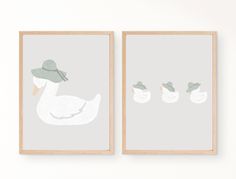 two framed pictures with ducks on them in front of a white wall and one has a gray background