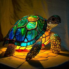 a turtle lamp sitting on top of a table