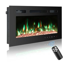 an electric fireplace with remote control on the side and green flames in the back ground