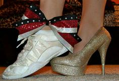 a pair of high heeled shoes with bows and sequins on the toes