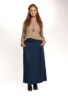 All around natural comfort and sustainable style is what this bamboo fabric maxi skirt with pockets is all about! Perfectly crafted for work or play in a timeless design that won't go out of style. Pair with boots, heels, sandals or flats for a variety of looks in a slimming silhouette. Eco-friendly fabric consciously made in the USA from sustainable fibers. Durable enough to machine wash and dry. Navy Maxi Skirt, Maxi Skirt With Pockets, Maxi Rock, Fabric Navy, Cowl Neck Hoodie, Knot Dress, Empire Waist Dress, Sustainable Style, Skirt With Pockets