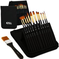 an assortment of makeup brushes in a black case next to a zippered pouch with its contents