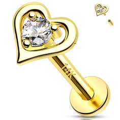 a gold heart shaped barbell with a crystal stone in the center and two hearts on each side