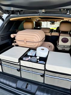 the back end of a car filled with luggage