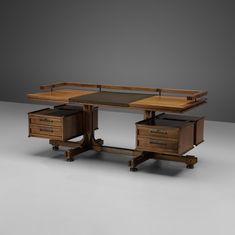 an image of a desk with drawers on the bottom and one drawer at the top