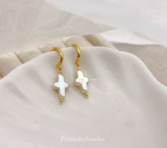 "Dainty Cross earrings | Genuine Freshwater Pearl | Cross Earrings | Minimalist earrings | Gold S925  | Thanksgiving gift  A dainty minimalist earring that is perfect for daily wear. The cross-shaped pearl makes it a perfect gift for Easter, Thanksgiving and church.  ✦MATERIAL✦ - Pearl: Freshwater baroque pearls in cross-shaped - 18k gold finish with S925  back  (perfect for sensitive skin)  ✦HOW CROSS-SHAPED✦ They are naturally formed but under oyster farmer's control. That's what so-called \"c Pearl Cross Earrings, Surf Jewelry, Minimalist Earrings Gold, Jewelry Accessories Ideas, Cross Earrings, Dope Jewelry, Pearl Earrings Dangle, Cross Jewelry, Hook Earrings