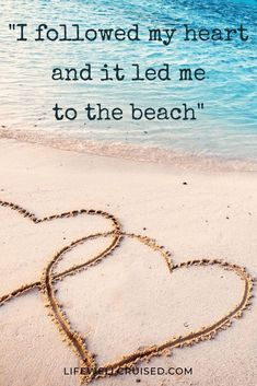 two hearts drawn in the sand with a quote about i followed my heart and it led me to the beach