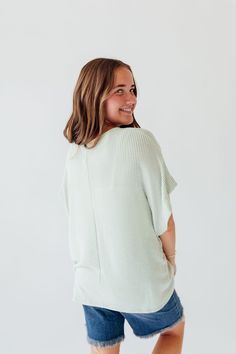 Experience comfort and style with the Journee Top. Its light green color with white stripes adds a touch of freshness, while the dolman sleeves and straight hem provide a relaxed fit. Perfect for any casual outing or lounging at home. Elevate your wardrobe with this versatile and chic top! Fits true to size. Model is wearing a small and is 5'3". Plus model is wearing a 1X and is 5'8". Size Chart Length Bust S 22" 48" M 22" 50" L 23" 48" 1x 24" 52" 2x 24" 54" 3x 25" 56" *All measurements are appr Comfortable Green Everyday Tops, Comfortable Green Tops For Everyday, Comfy Short Sleeve Tops For Spring, Comfy Short Sleeve Spring Tops, Comfy Green Cotton Top, Comfortable Ribbed Tops For Spring, Spring Sage Tops For Ladies, Comfortable Green Tops For Loungewear, Casual Green Tops For Day Out