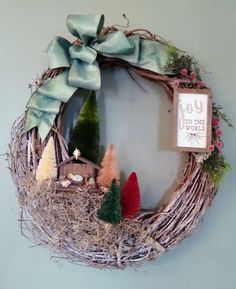 a wreath with christmas decorations on it