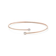 Inspired by linear beauty, the Diamond Hoop collection epitomizes modern simplicity. This sleek bangle is defined by overlapping ends accented with shimmering diamonds. 18k rose gold with two round brilliant diamonds; Size small; Fits wrists up to 5.75"; Carat total weight .23; Original designs copyrighted by Elsa Peretti | Elsa Peretti® Diamond Hoop Single-Row Bangle Bracelet in 18K Rose Gold with Diamonds, Size: Small Diamond Bracelet Design, Modern Gold Jewelry, Gold Armband, Gold Rings Fashion, Jewelry Bracelets Gold, Gold Ring Designs, Elsa Peretti, Bracelets Gold Diamond, Gold Jewelry Simple