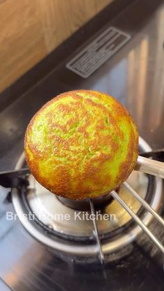 a muffin is being cooked on the stove