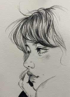 a black and white drawing of a woman's face with her hand on her chin