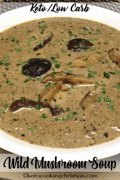 a white bowl filled with mushroom soup on top of a table