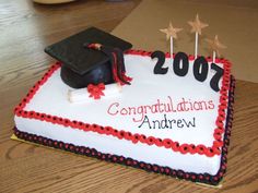 a graduation cake with congratulations written on it